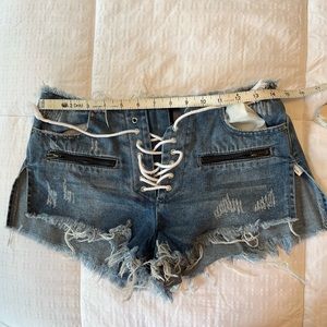 Distressed jean short shorts